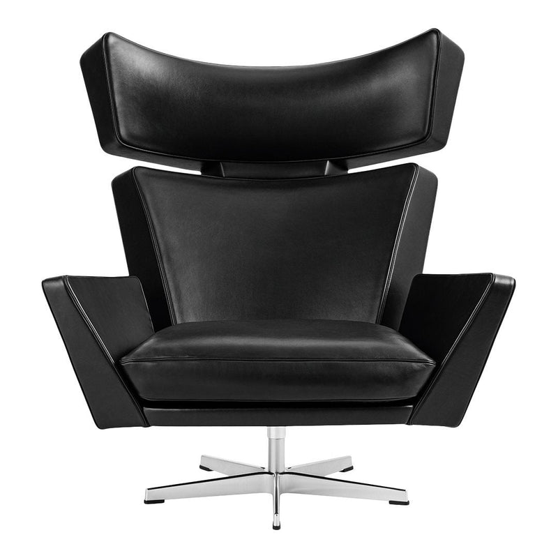 Black leather modern chair with sleek design and geometric patterns, featuring a chrome base. Perfect for stylish interiors.