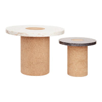 "Modern side tables in natural cork with white and dark marble tops, featuring sleek, minimalist designs."