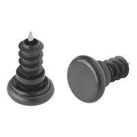 Black rubber stoppers with textured patterns and sharp tips, ideal for furniture protection and floor maintenance.