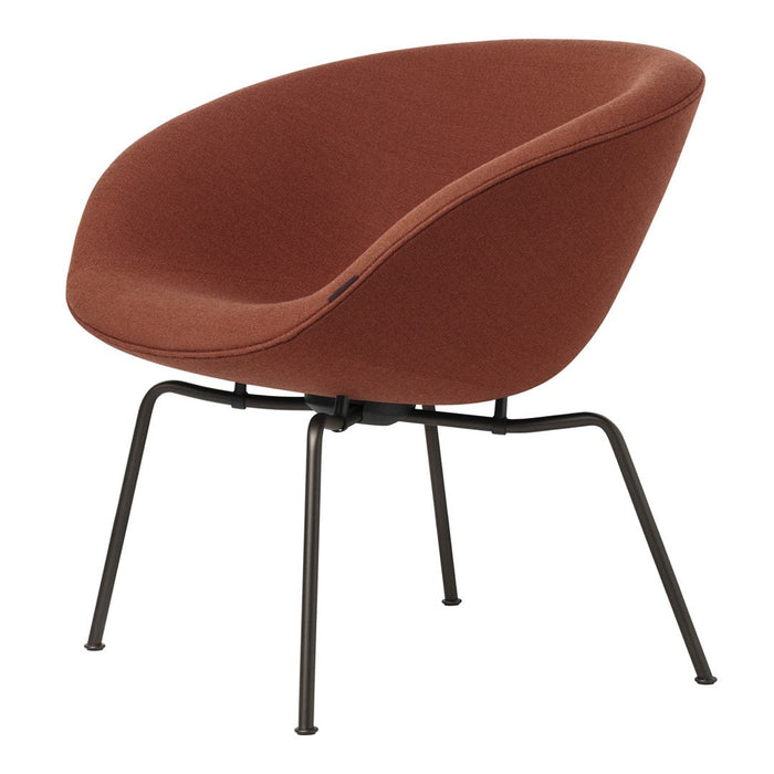 Rust-colored upholstered chair with a smooth texture and sleek black metal legs. Ideal for modern decor.