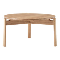 Natural oak round coffee table with a smooth finish and minimalist design, featuring light wood tones and clean lines.