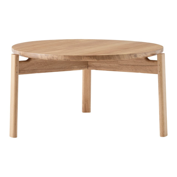 Natural oak round coffee table with a smooth finish and minimalist design, featuring light wood tones and clean lines.