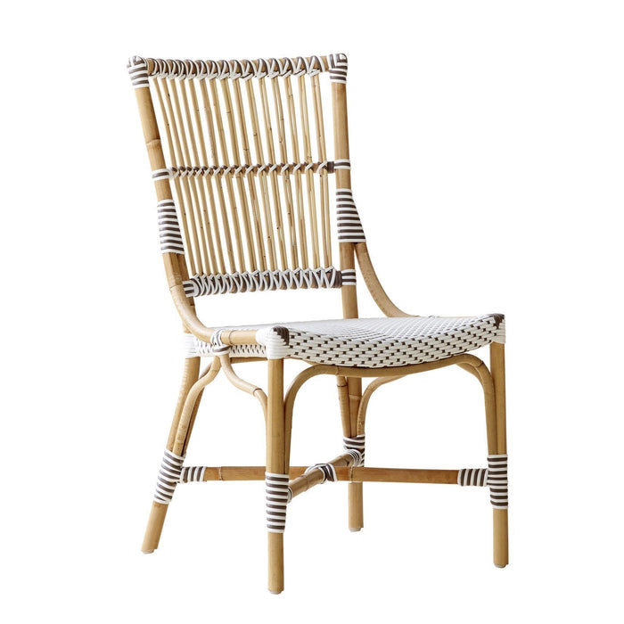 Natural bamboo chair with white and black striped patterns. Elegant, modern design suitable for various decor styles.