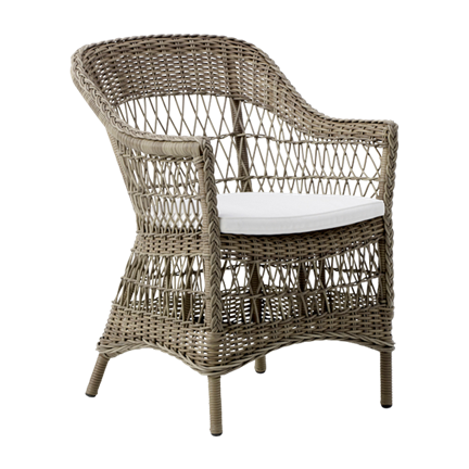Cozy woven chair in natural beige with a white cushion, featuring intricate patterns and a stylish, modern design.