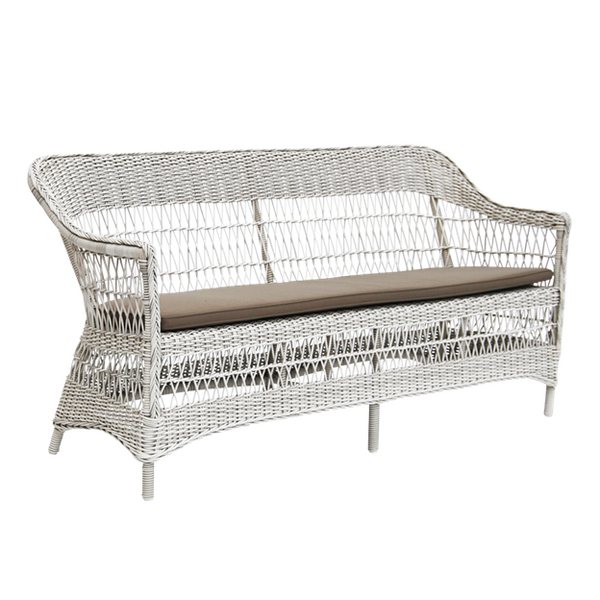 White woven wicker sofa with a solid beige cushion, featuring a sleek and modern design. Perfect for outdoor settings.