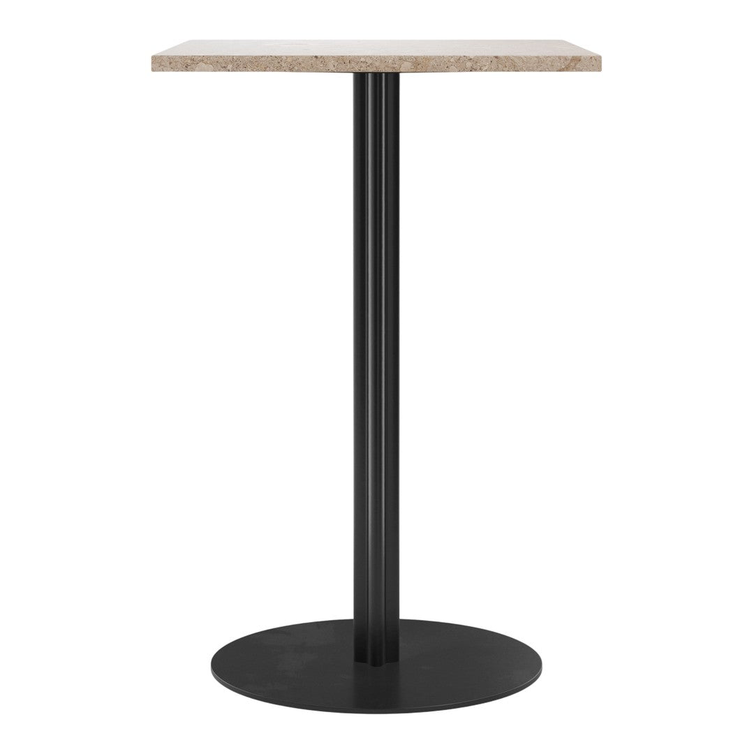 Black metal base with a light beige, textured top; modern design for versatile decor style.