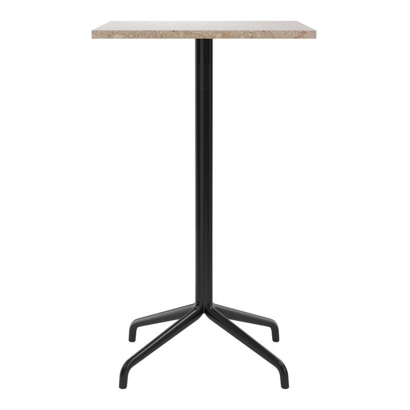 Black metal bar table with a light beige stone finish. Sleek, modern design suitable for various settings.