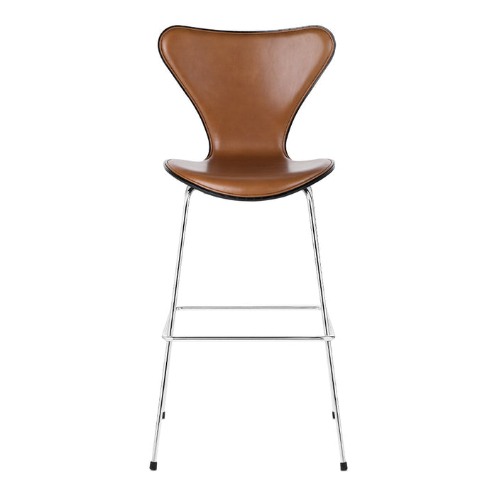 Brown leather bar stool with a sleek, curved design and chrome legs for a modern touch. Stylish and functional.