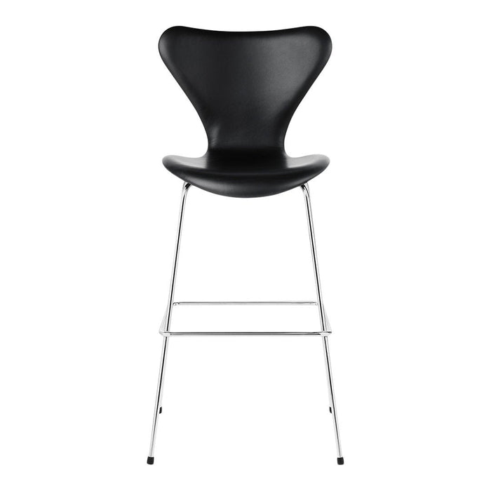 Black modern bar stool with a sleek, curved design and chrome legs. Ideal for contemporary spaces.