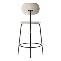 Modern bar stool with a light beige fabric seat and a simple black metal frame. Elegant and minimalistic design.