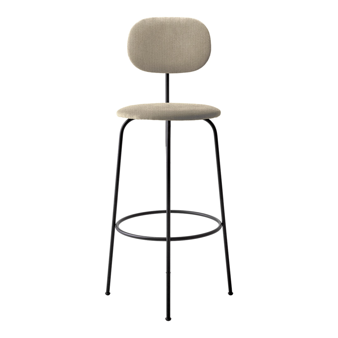 Beige upholstered bar stool with a minimalist black metal frame and smooth, rounded shapes.