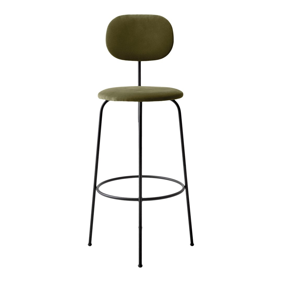 Olive green upholstered bar stool with minimalist black metal legs and simple, modern design.