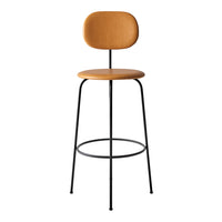 Tan seat and backrest on a sleek black metal frame, featuring a minimalist design for modern decor.