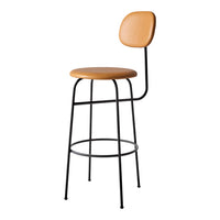 Stylish bar stool with a warm tan seat and backrest, complemented by a sleek black metal frame.