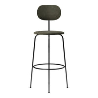 Green upholstered bar stool with a sleek black metal frame and minimalist design, perfect for modern interiors.
