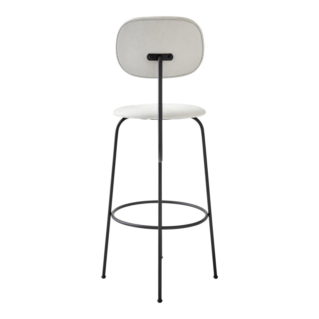 White bar stool with a smooth finish and minimalist black metal legs, featuring a modern, clean design.