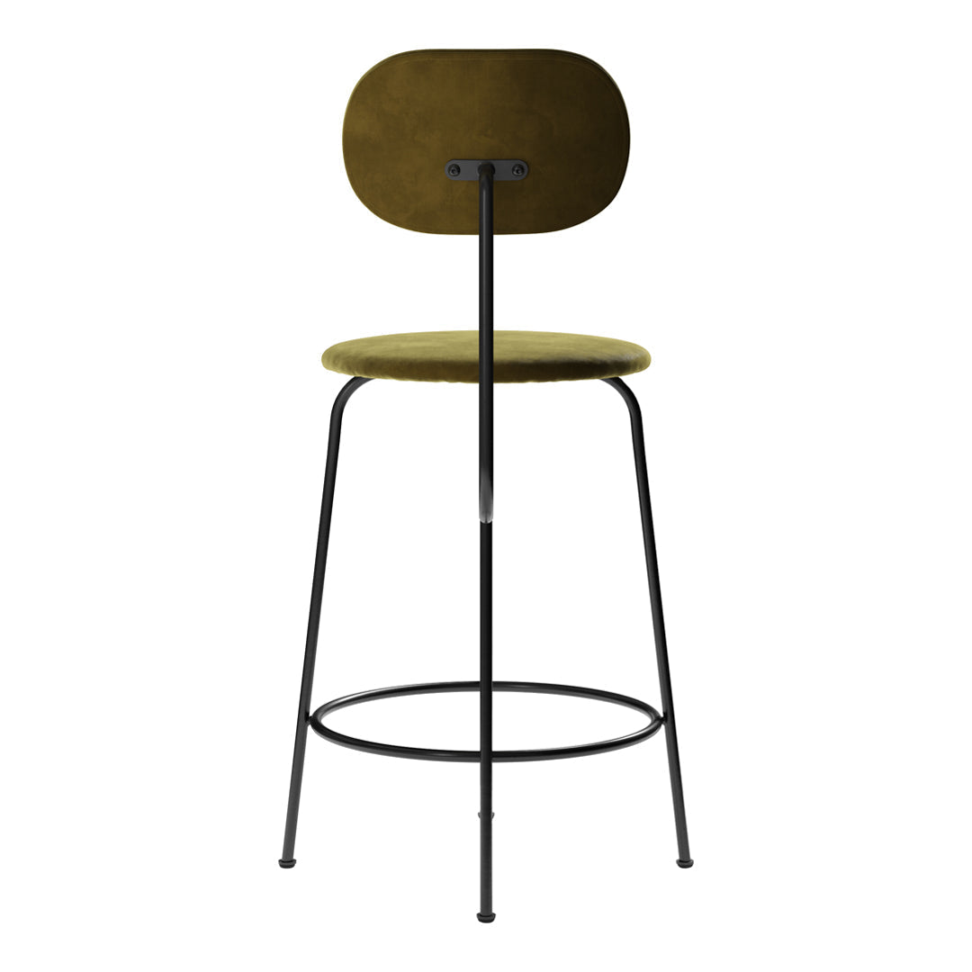 Olive green upholstered bar stool with a smooth seat and minimalist black metal legs. Modern and stylish design.