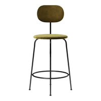 Green suede bar stool with a minimalist black metal frame and rounded backrest, featuring a sleek, modern design.