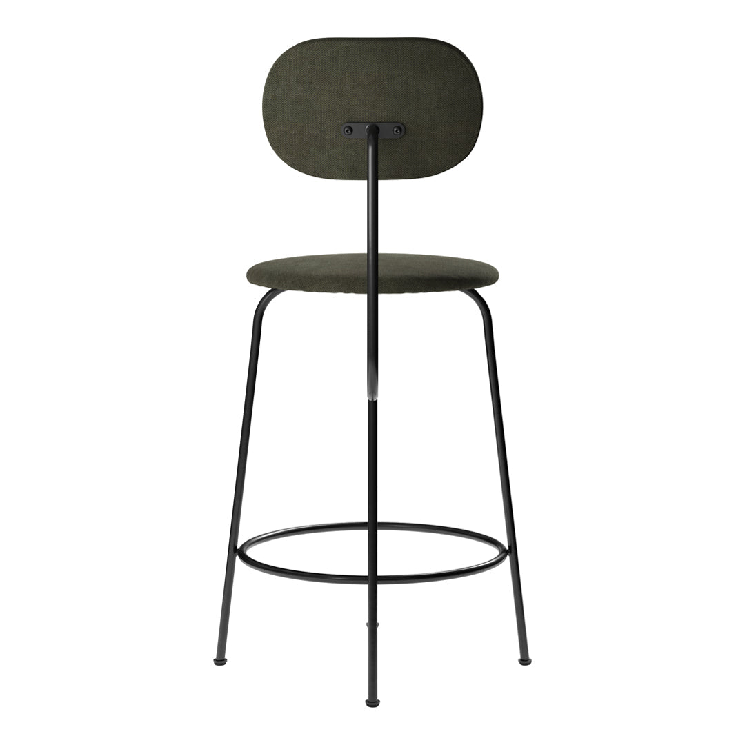 Green upholstered bar stool with minimalistic black metal frame and smooth, rounded shapes. Ideal for modern decor.