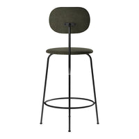 Green upholstered bar stool with minimalistic black metal frame and smooth, rounded shapes. Ideal for modern decor.