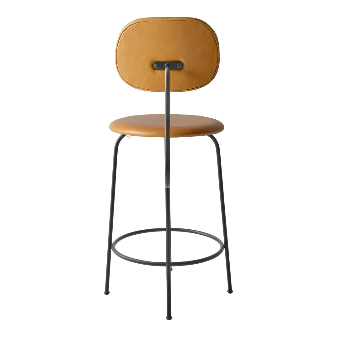 Tan leather bar stool with a smooth finish and black metal legs, featuring a minimalist design.