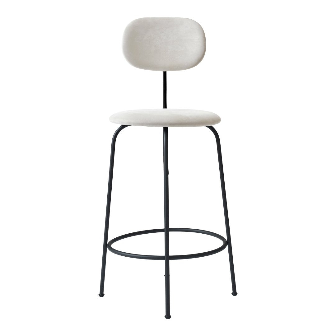 Neutral beige upholstered bar stool with a sleek black metal frame and minimalist design. Perfect for modern decor.