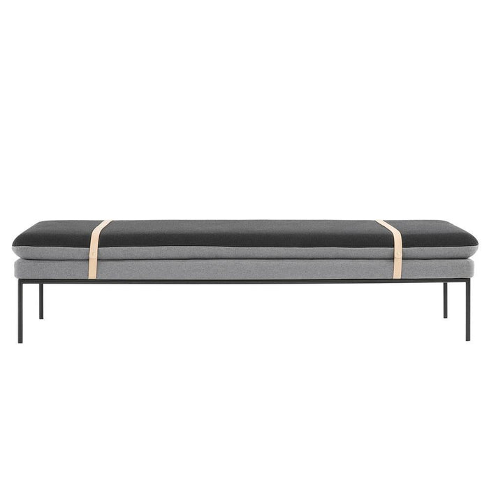 Sleek black and grey two-tone bench with minimalist design and natural wood accent strap.