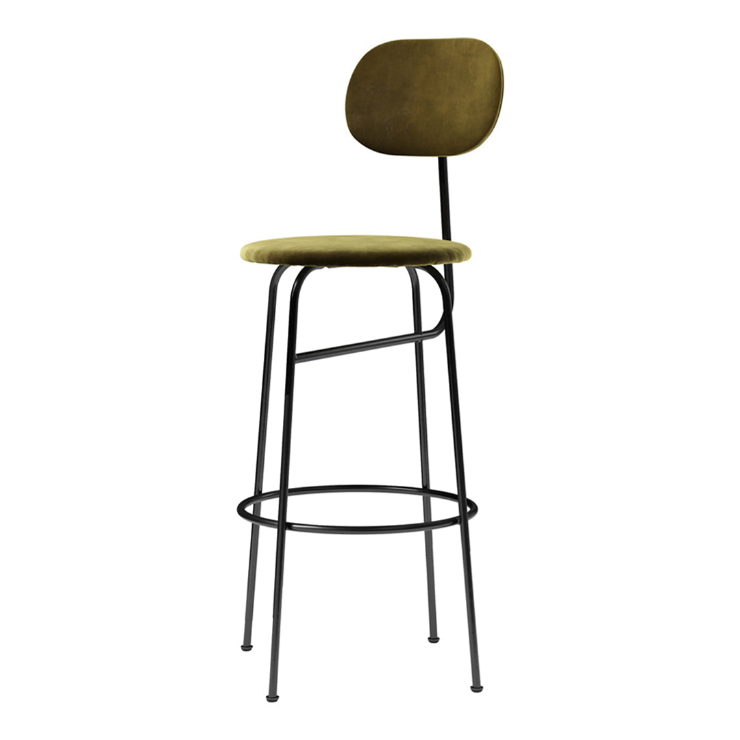 Olive green velvet bar stool with a minimalist black metal frame and sleek, modern design.