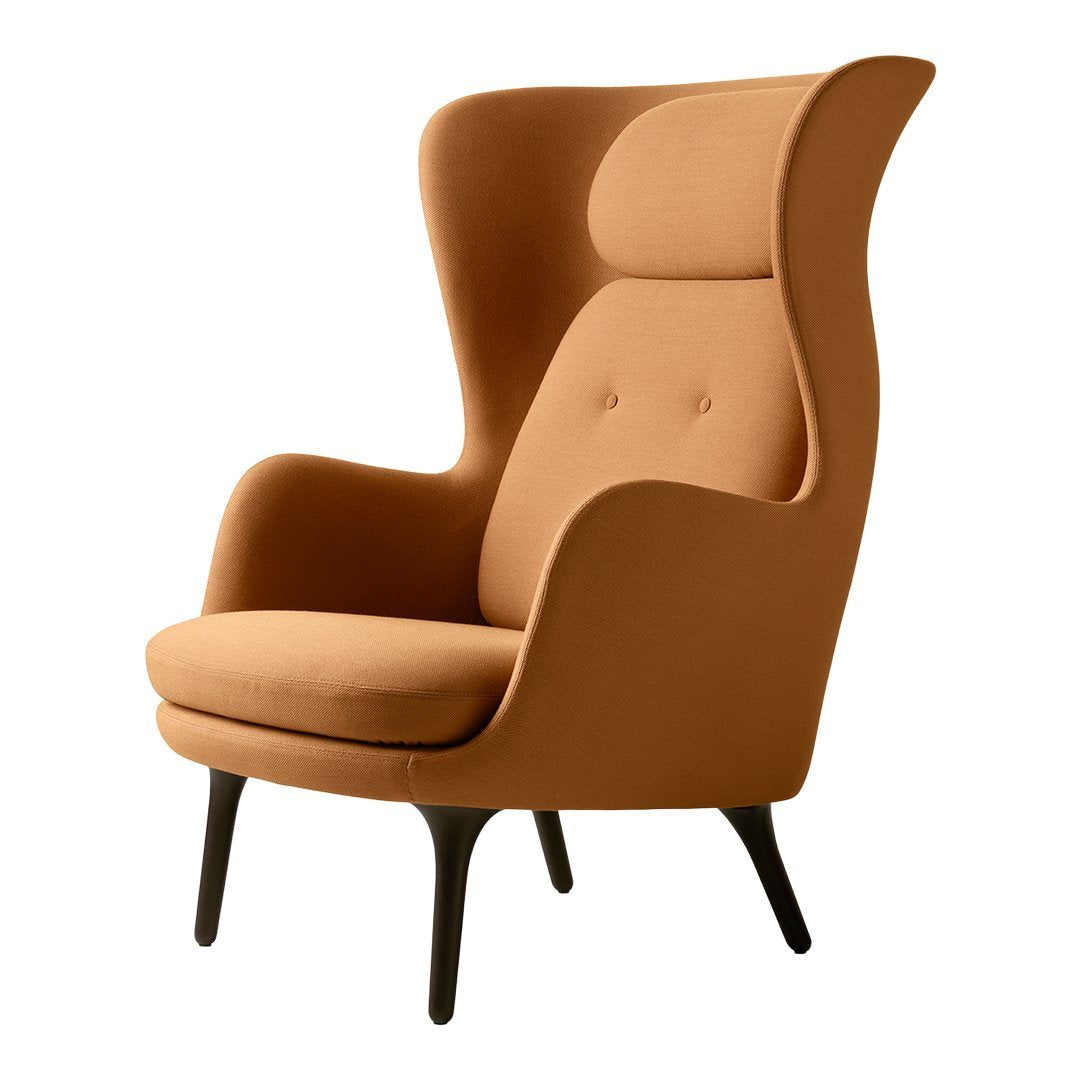 Brown upholstered high-back chair with a smooth, modern design and subtle button detailing. Elegant and stylish accent piece.