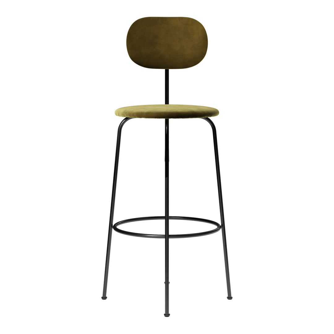 Olive green velvet bar stool with a sleek black metal frame and minimalist design. Modern, stylish, and versatile.