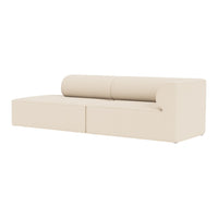 Beige modern sofa with smooth, minimalistic design and rounded backrest, ideal for contemporary living spaces.