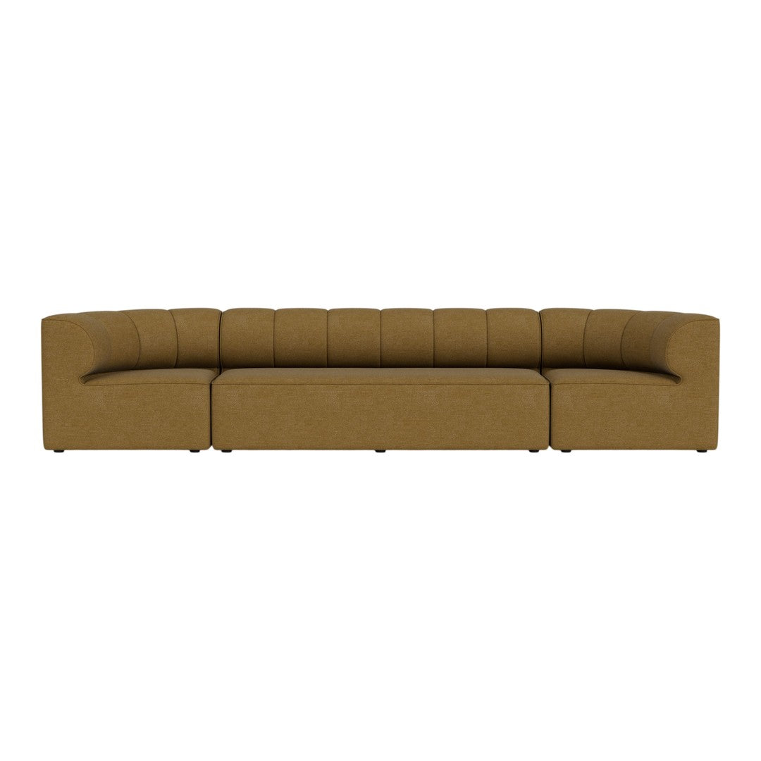 Stylish mustard yellow sectional sofa with a modern tufted pattern, perfect for contemporary living spaces.