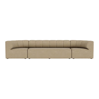 Beige curved sectional sofa with vertical tufted pattern, perfect for modern living spaces.