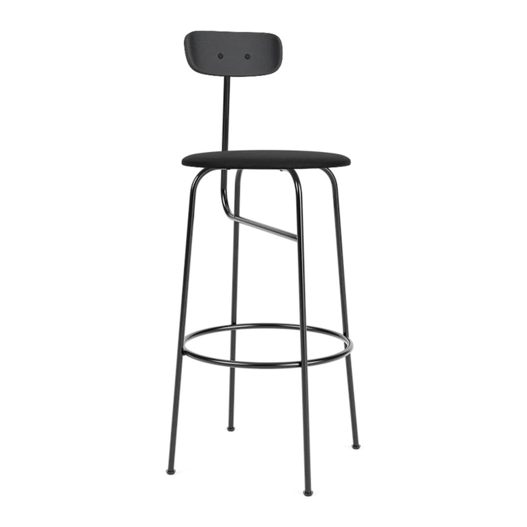 Black metal bar stool with a simple, minimalist design and smooth seat. Ideal for modern interiors.