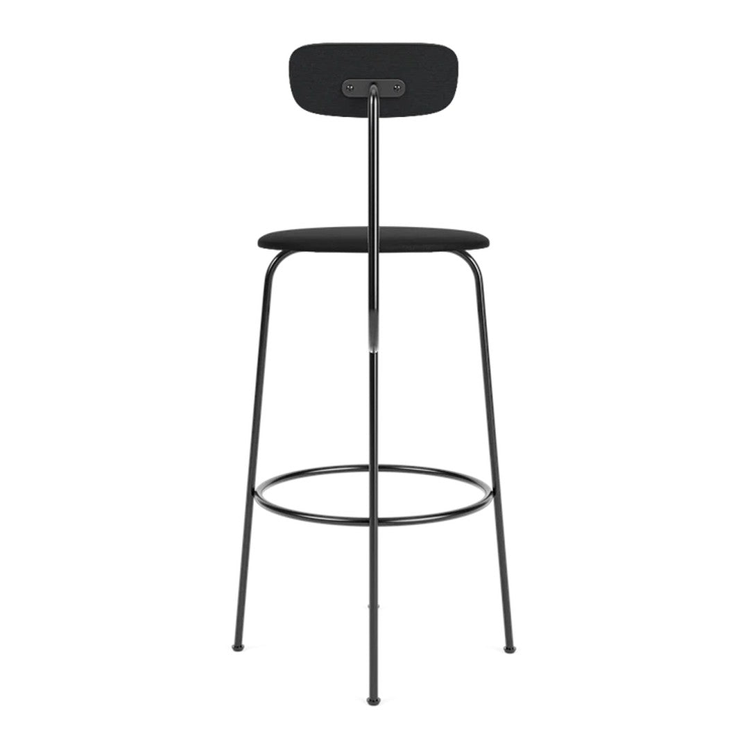 Black bar stool with a minimalist design and sleek metal legs, featuring a smooth, round black seat.