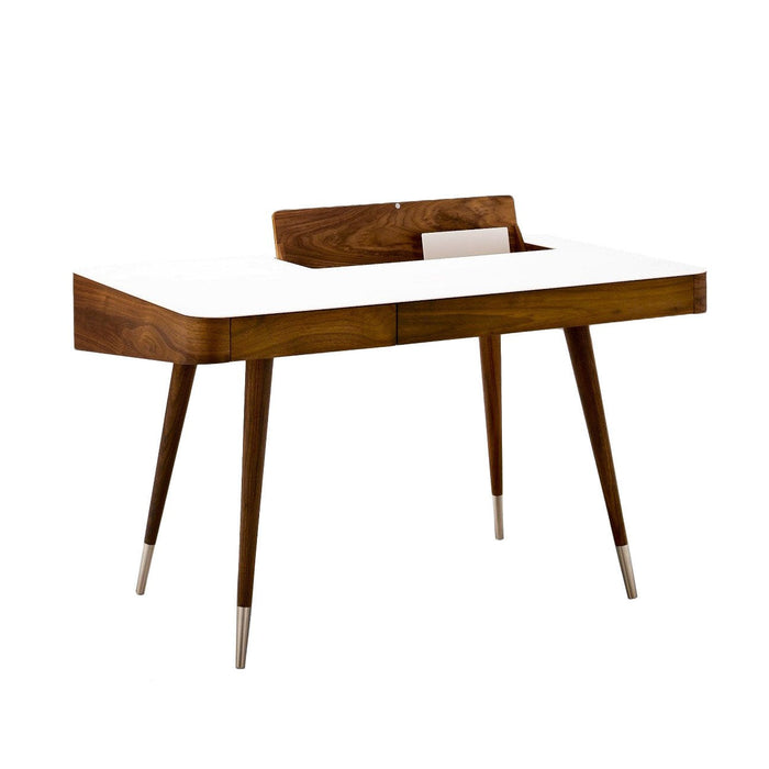 Mid-century modern desk in rich walnut wood with a sleek white top and tapered legs featuring elegant silver tips.