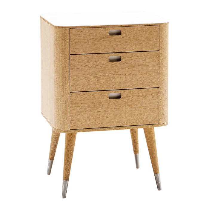 Mid-century modern nightstand in light oak with three drawers and silver accents on tapered legs.