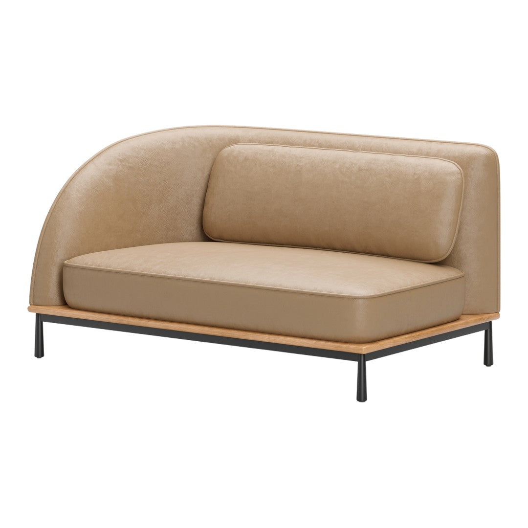 Beige leather sofa with a sleek rounded design and wooden base, featuring smooth textures and minimalistic style.