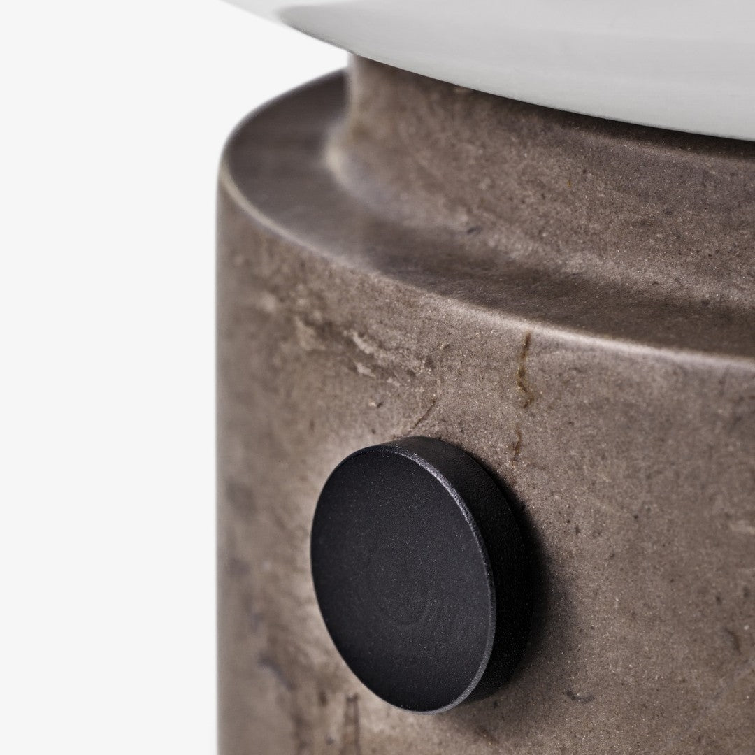 Black accent on a textured gray stone base with smooth, white top; minimalistic and modern design.