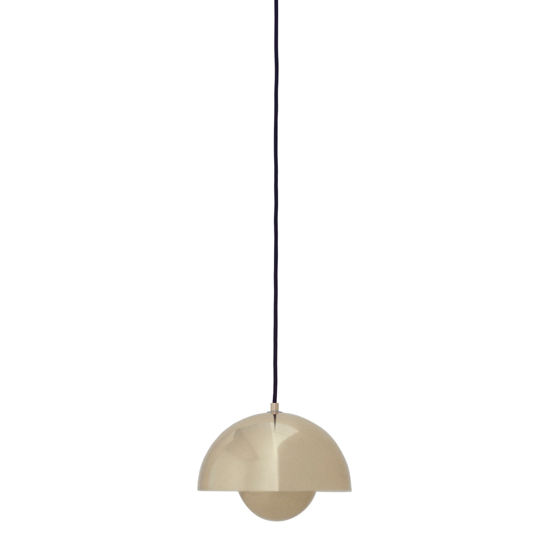 Gold pendant lamp with a sleek half-moon design, complemented by a black cord. Modern and elegant lighting solution.