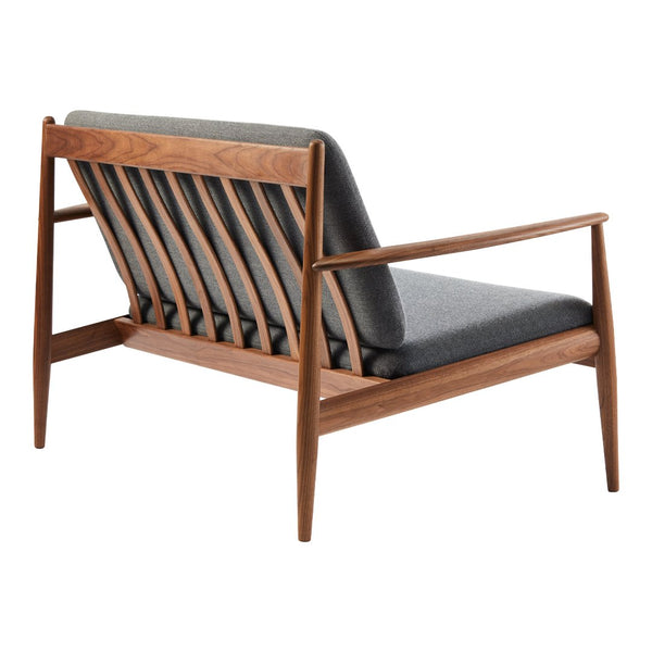 Mid-century modern chair with a dark gray fabric seat and walnut wood frame showcasing a slatted back design.