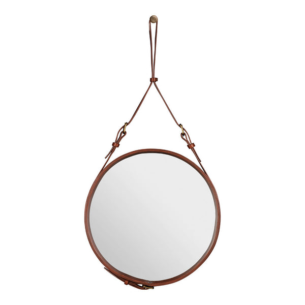 Round mirror with a sleek silver surface and a warm brown leather strap for modern decor.