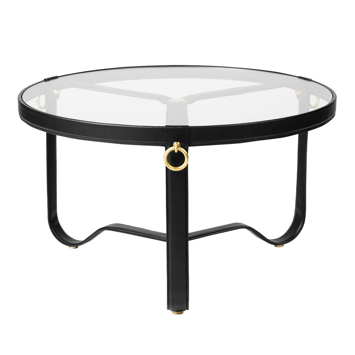 Round coffee table with a sleek black metal frame and a clear glass top, featuring elegant gold accent details.