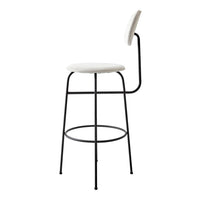 Minimalist white bar stool with a sleek black metal frame and curved backrest for a modern look.