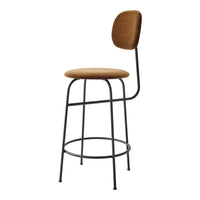 Brown upholstered bar stool with a sleek black metal frame and minimalist design. Perfect for modern interiors.