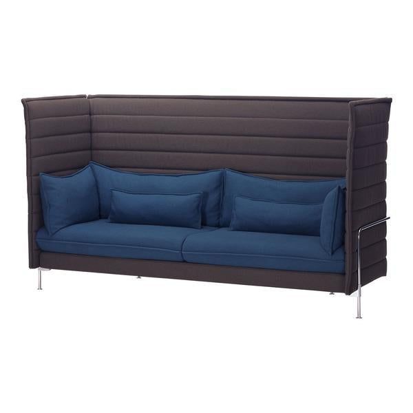 Modern two-tone sofa with dark brown frame and deep blue cushions, featuring horizontal ribbed patterns. Perfect for stylish spaces.