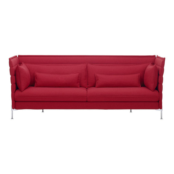 Bright red modern sofa with a textured fabric and sleek silver legs, featuring plush cushions for added comfort.
