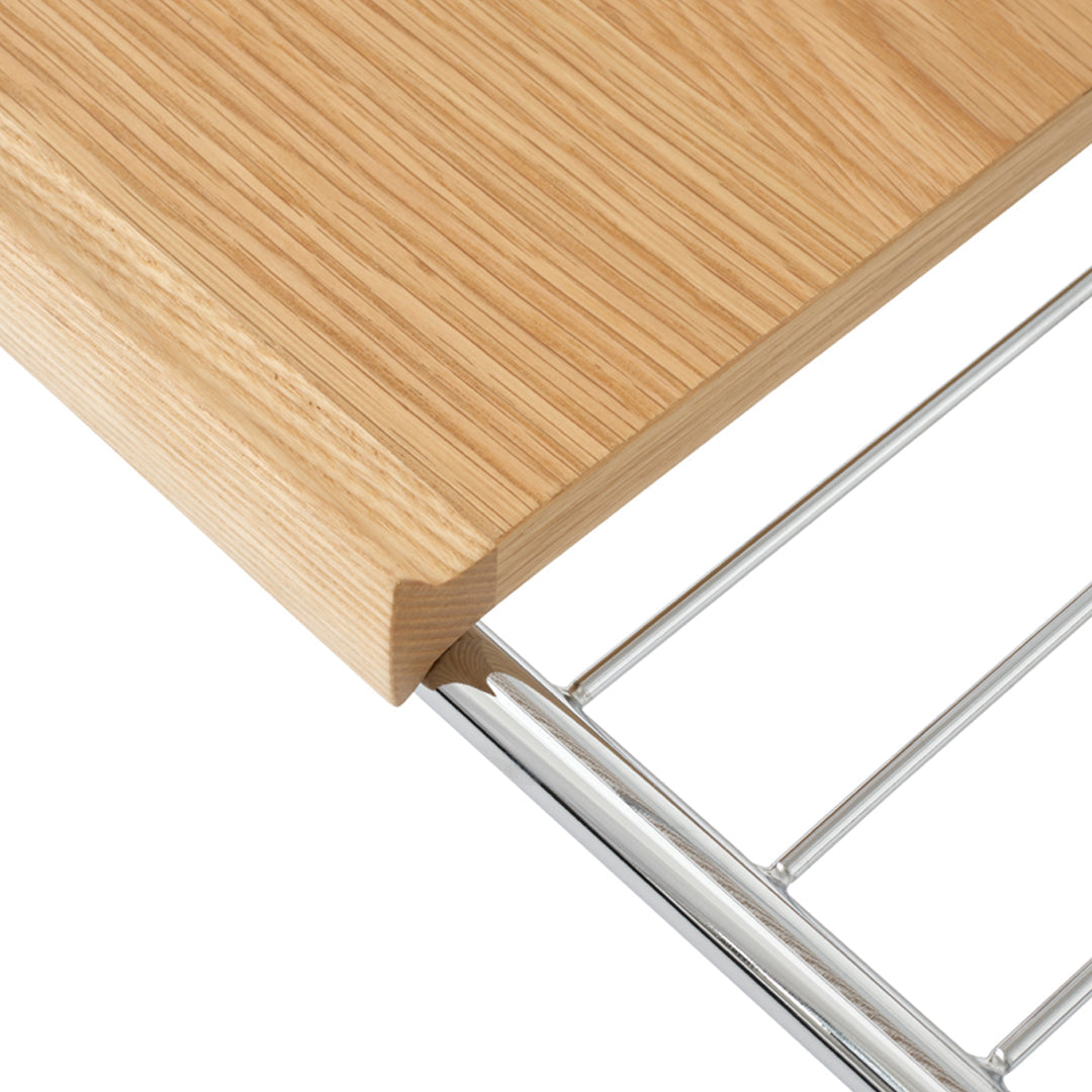 Light oak wood grain with a smooth finish and sleek chrome accents, showcasing a modern, clean design.