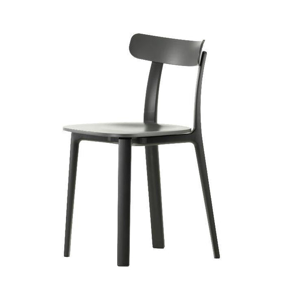 Modern black dining chair with a sleek matte finish and minimalistic design. Perfect for contemporary spaces.