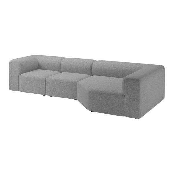 Modern L-shaped sofa in light gray fabric with a smooth, minimalist design and no visible patterns.